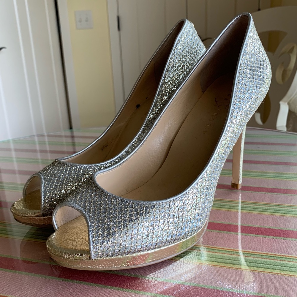 Ivanka Trump silver and gold platform heels